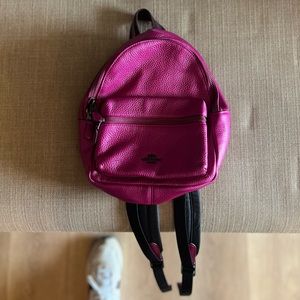 Small pink/ fuchsia Coach backpack